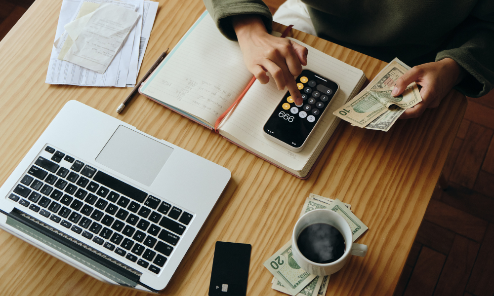 Building strong business credit.|A man holding up his business credit score.