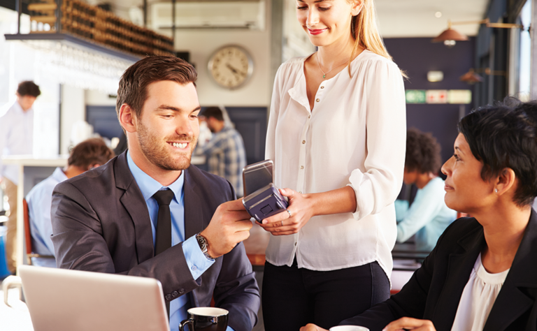Customer using their phone for touchless payment