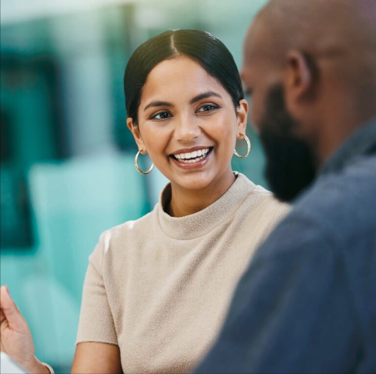 Smiling woman interacting with a customer